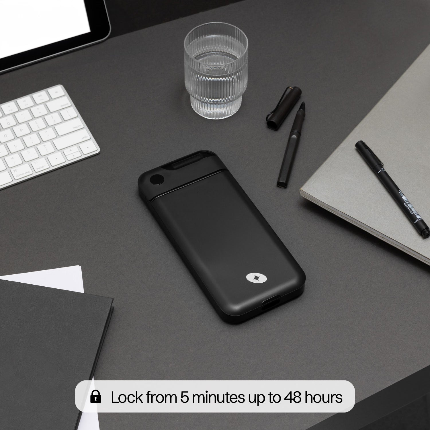 The Lockbox locked on a desk — lock from 5 minutes up to 48 hours