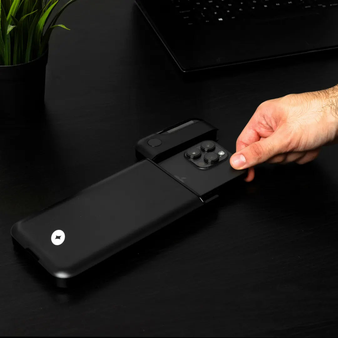 A hand reaching through the silicone mid-lock hatch while the Lockbox stays locked